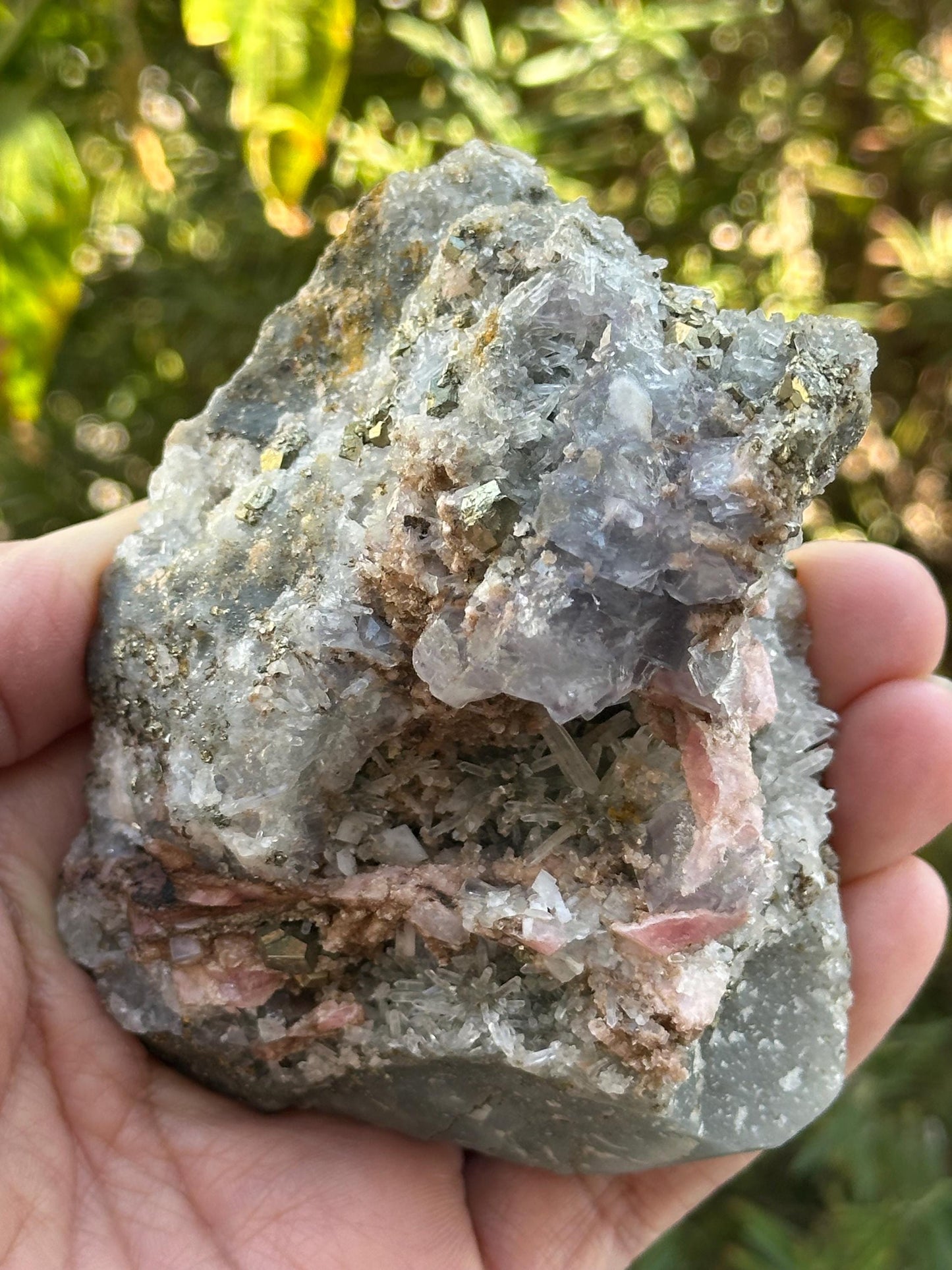 Rhodochrosite with Pyrite, Quartz, and Fluorite from the Wutong Mine, Guangxi, China - UV Reactive
