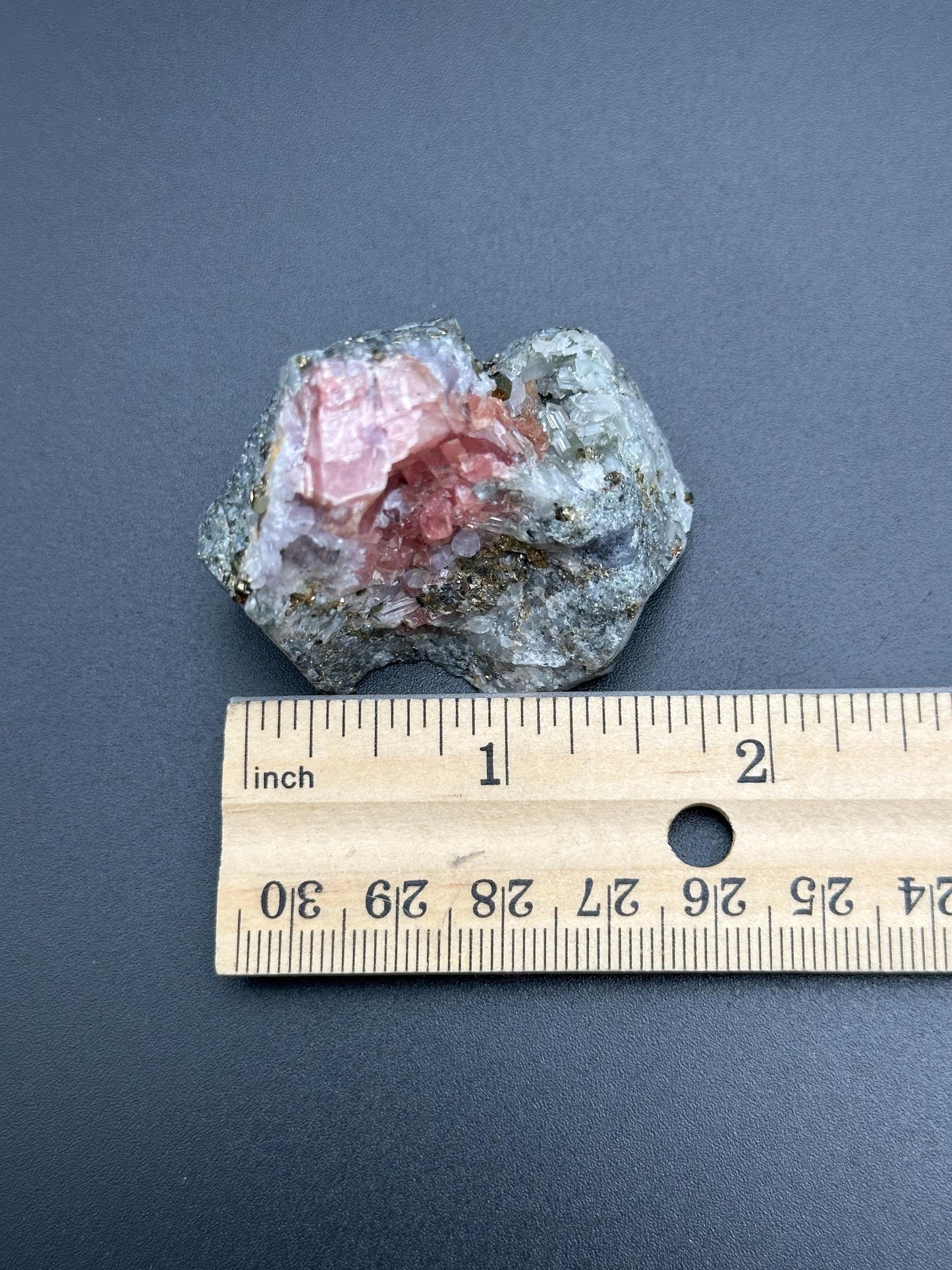 Rhodochrosite with Pyrite and Quartz on Matrix from the Wutong Mine in China