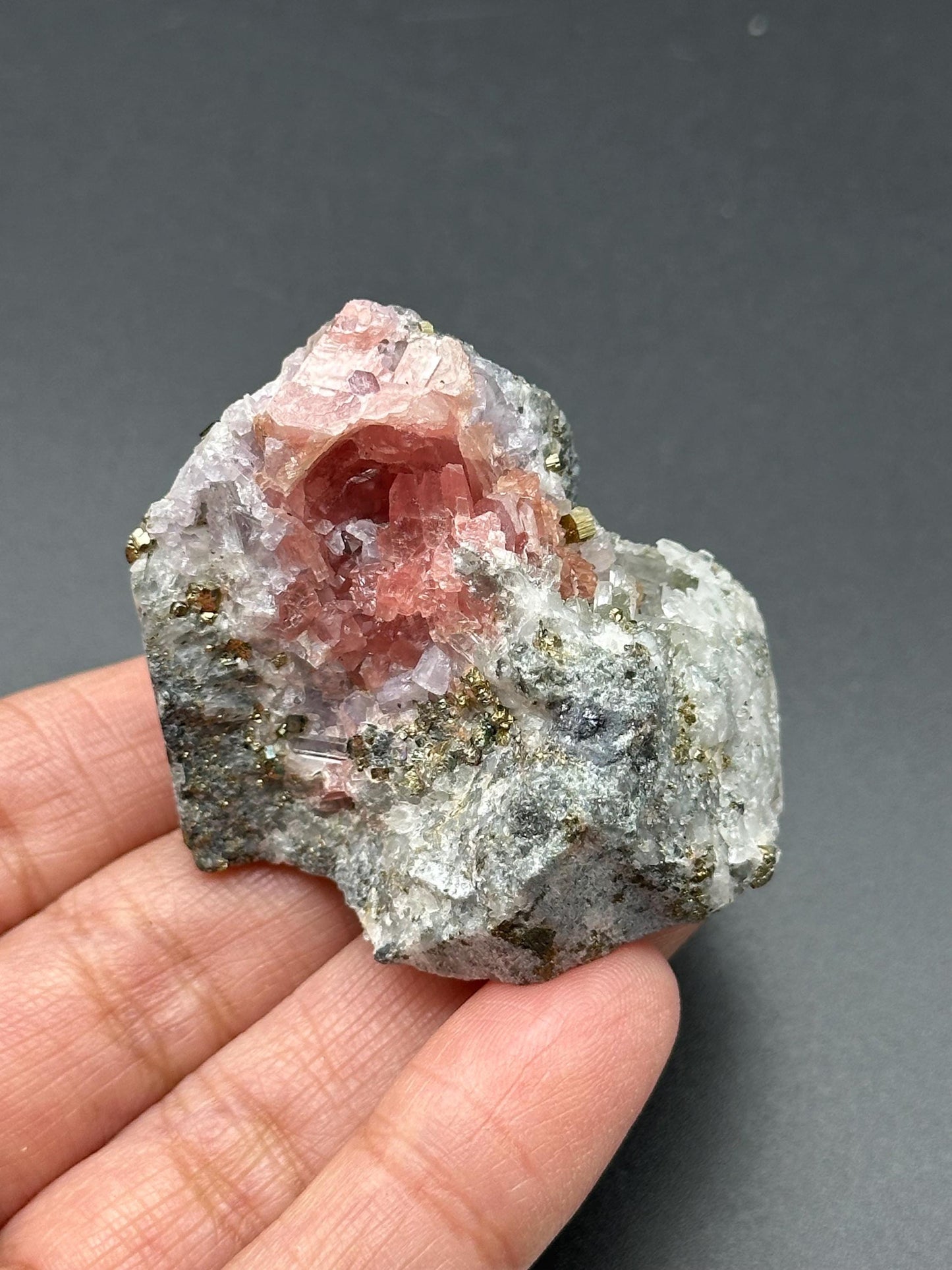 Rhodochrosite with Pyrite and Quartz on Matrix from the Wutong Mine in China