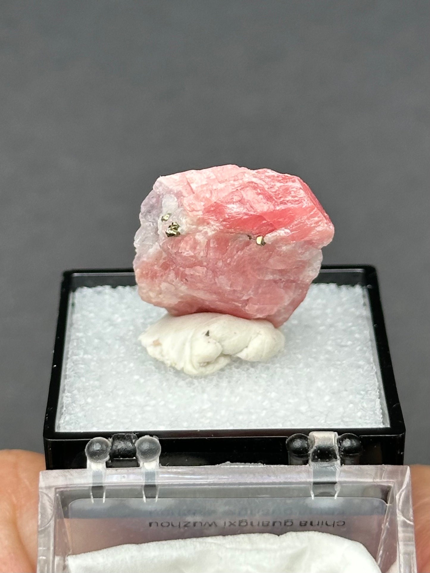 Rhodochrosite Specimen in a small perky box from Wutong Mine