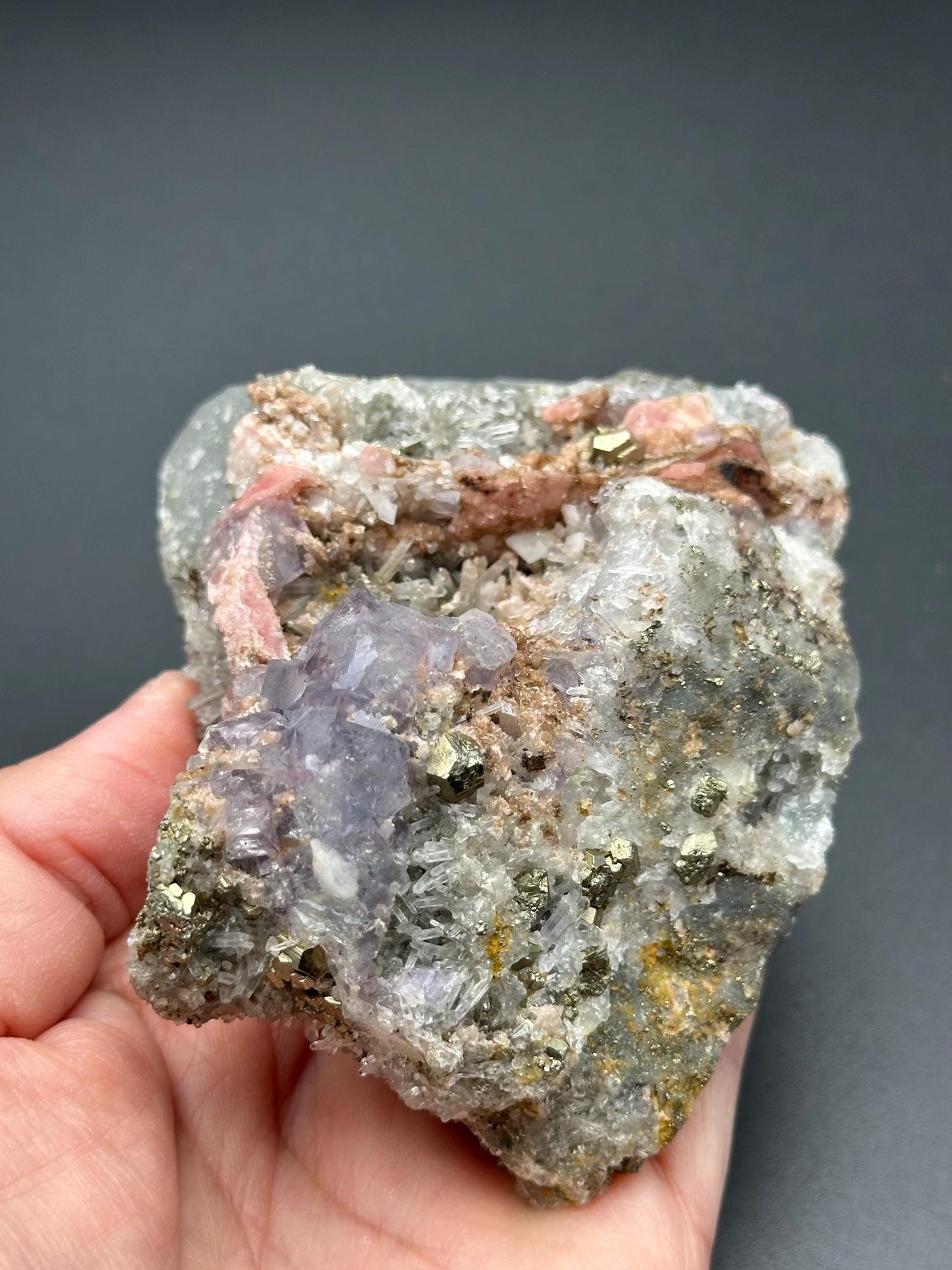 Rhodochrosite with Pyrite, Quartz, and Fluorite from the Wutong Mine, Guangxi, China - UV Reactive