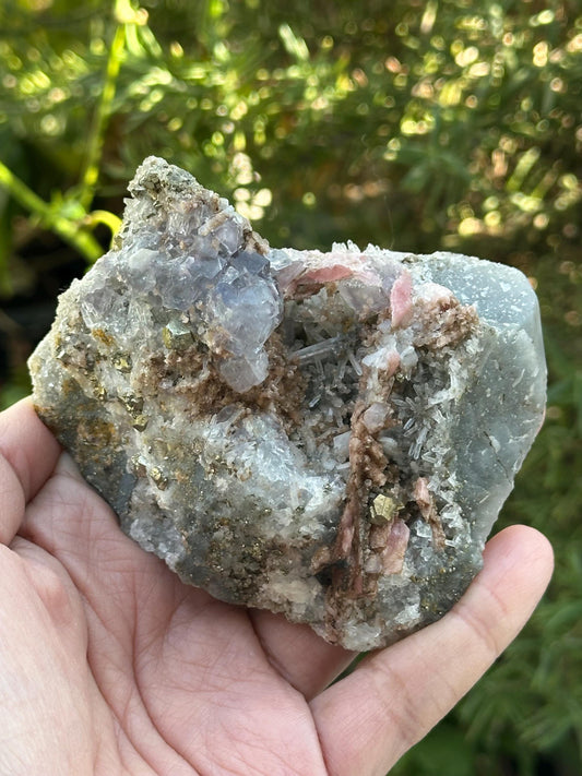 Rhodochrosite with Pyrite, Quartz, and Fluorite from the Wutong Mine, Guangxi, China - UV Reactive